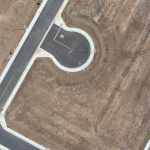 Professional climbing a career ladder, representing success achieved through enhanced emotional intelligence.